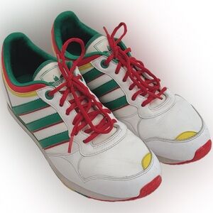 Vintage Adidas White Sneakers with Red, Green, and Yellow Highlights.
